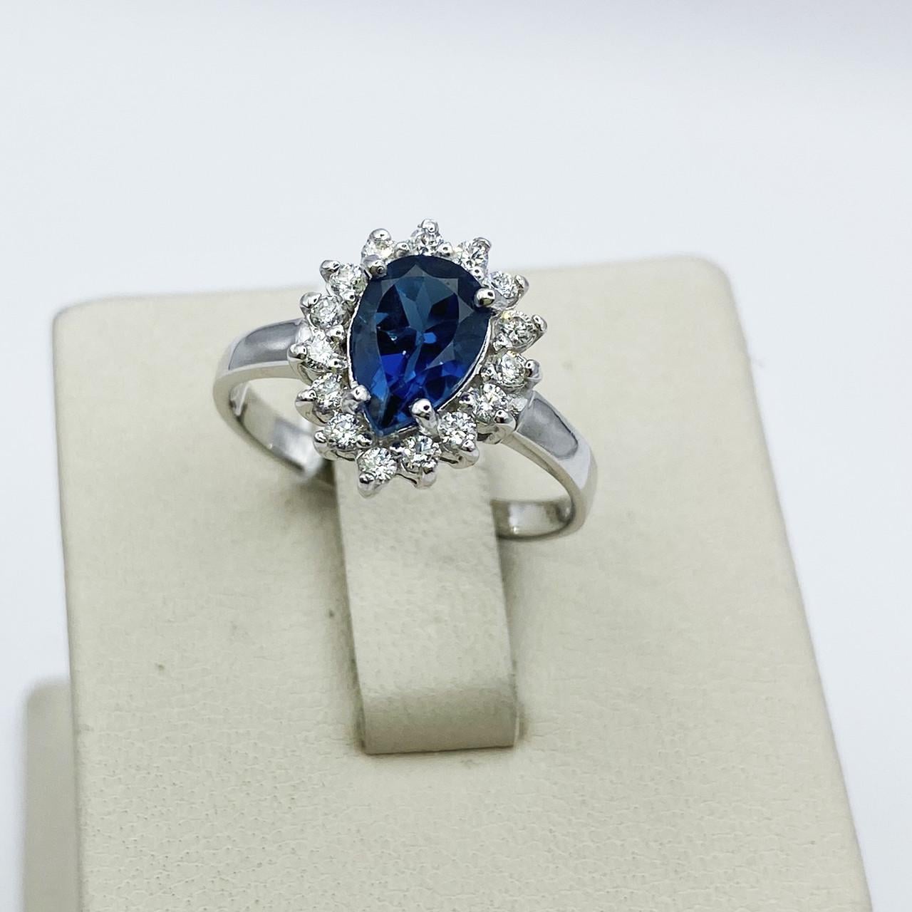 Кольцо серебряное с лондон топазом и кубическим цирконием р. 17,5 2,62 г (1941308040)