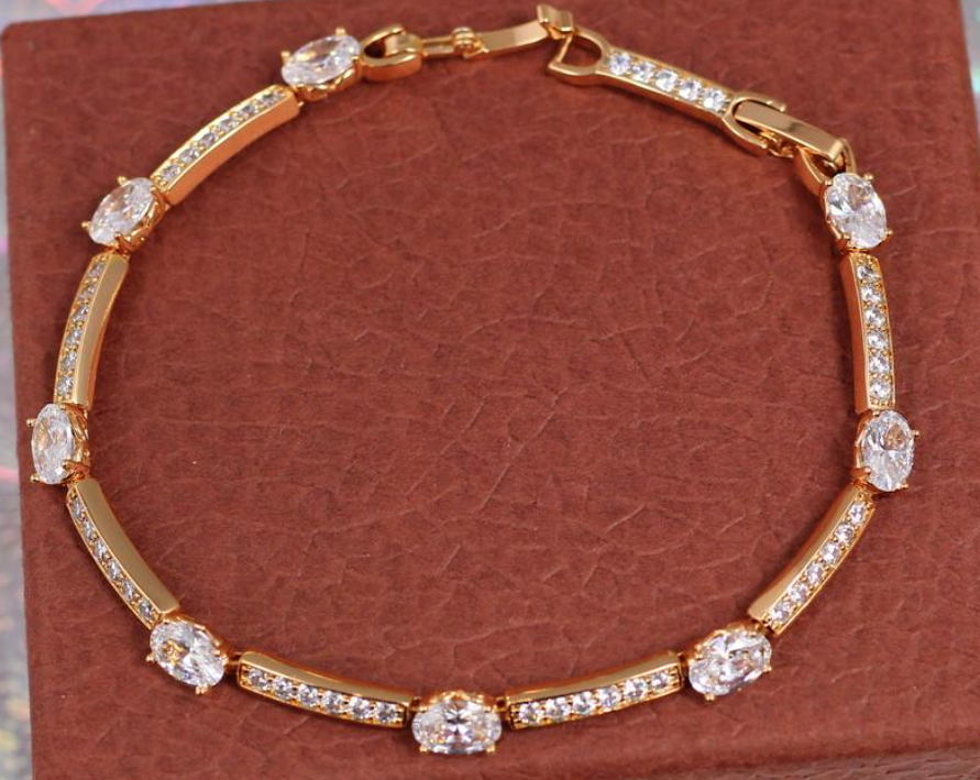 Браслет Xuping Jewelry дорожки с белыми овальными камнями 18 см 5 мм Золотистый