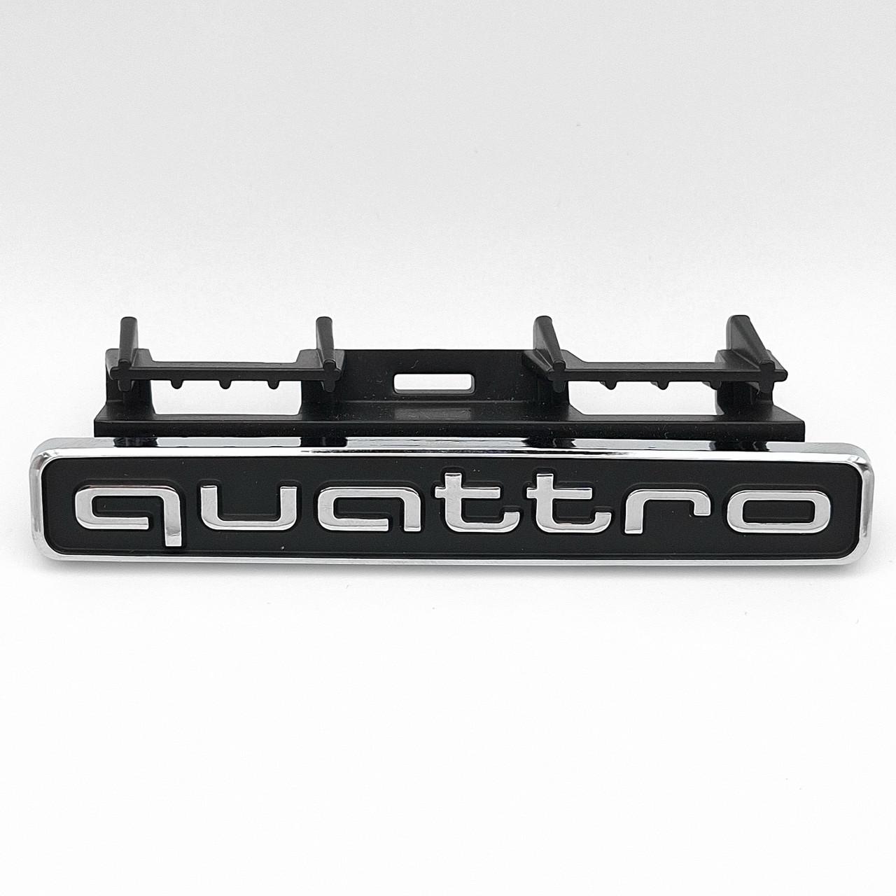 Эмблема радиаторной решетки Quattro Audi 95х14 мм Хром/Черный (8KO 853 736 B A6 C8)