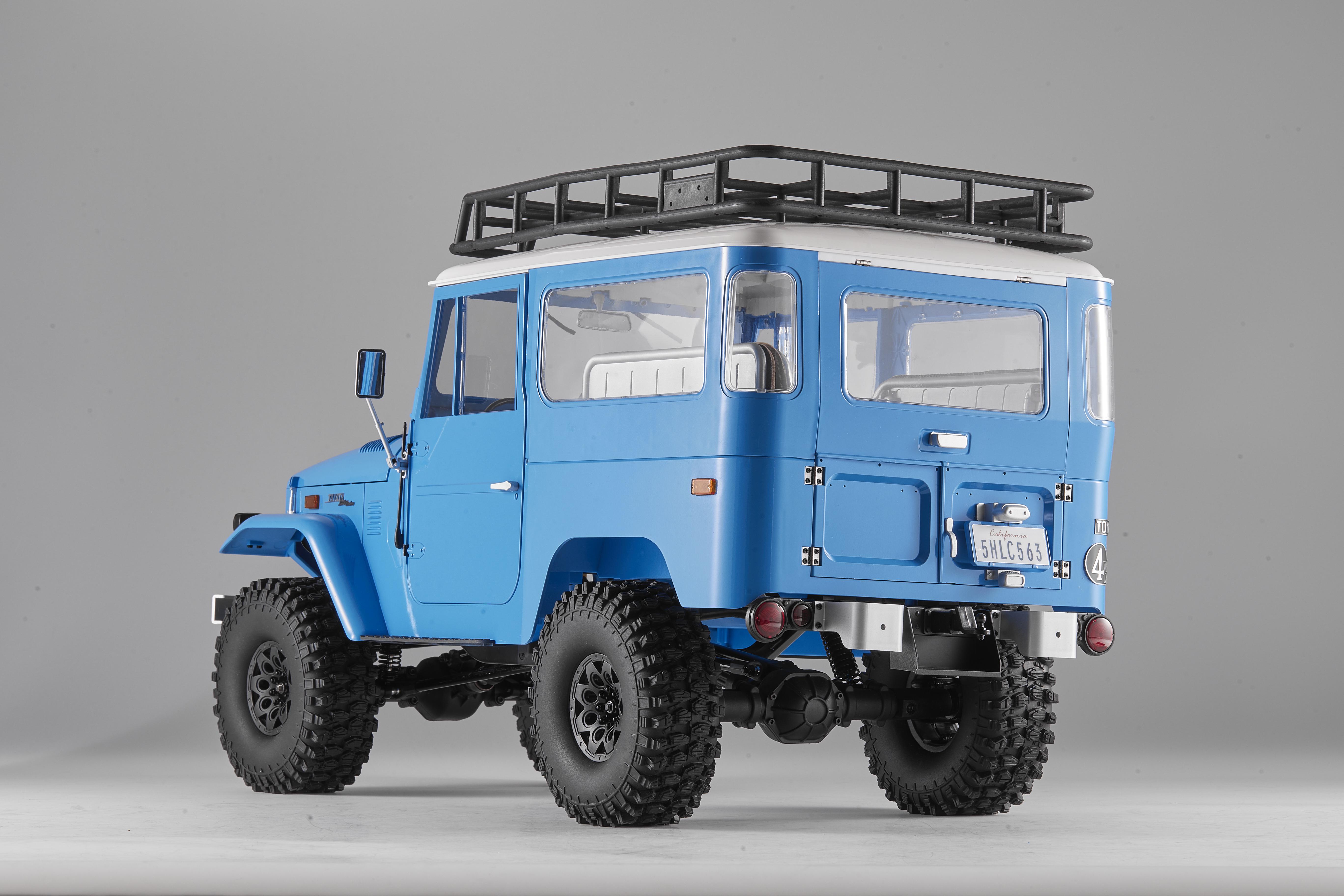 Машинка на радиоуправлении FMS 1:10 Toyota Land Cruiser FJ40 RS Blue - фото 11 Машинка на радиоуправлении FMS 1:10 Toyota Land Cruiser FJ40 RS Blue - фото 11