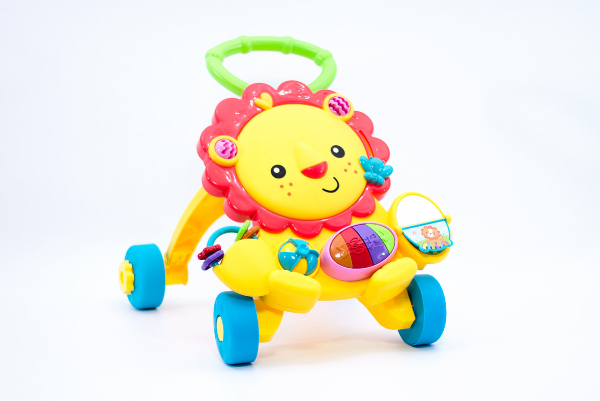 Ходунки каталка H-Y Toys детский игровой музыкальный развивающий центр в виде львенка оранжевые