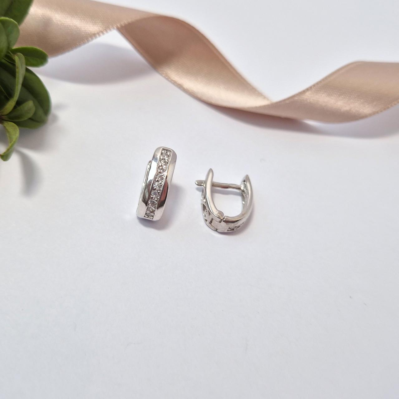 Сережки ява в білих каменях срібло 925 проби родоване 3,00 г (20077р)