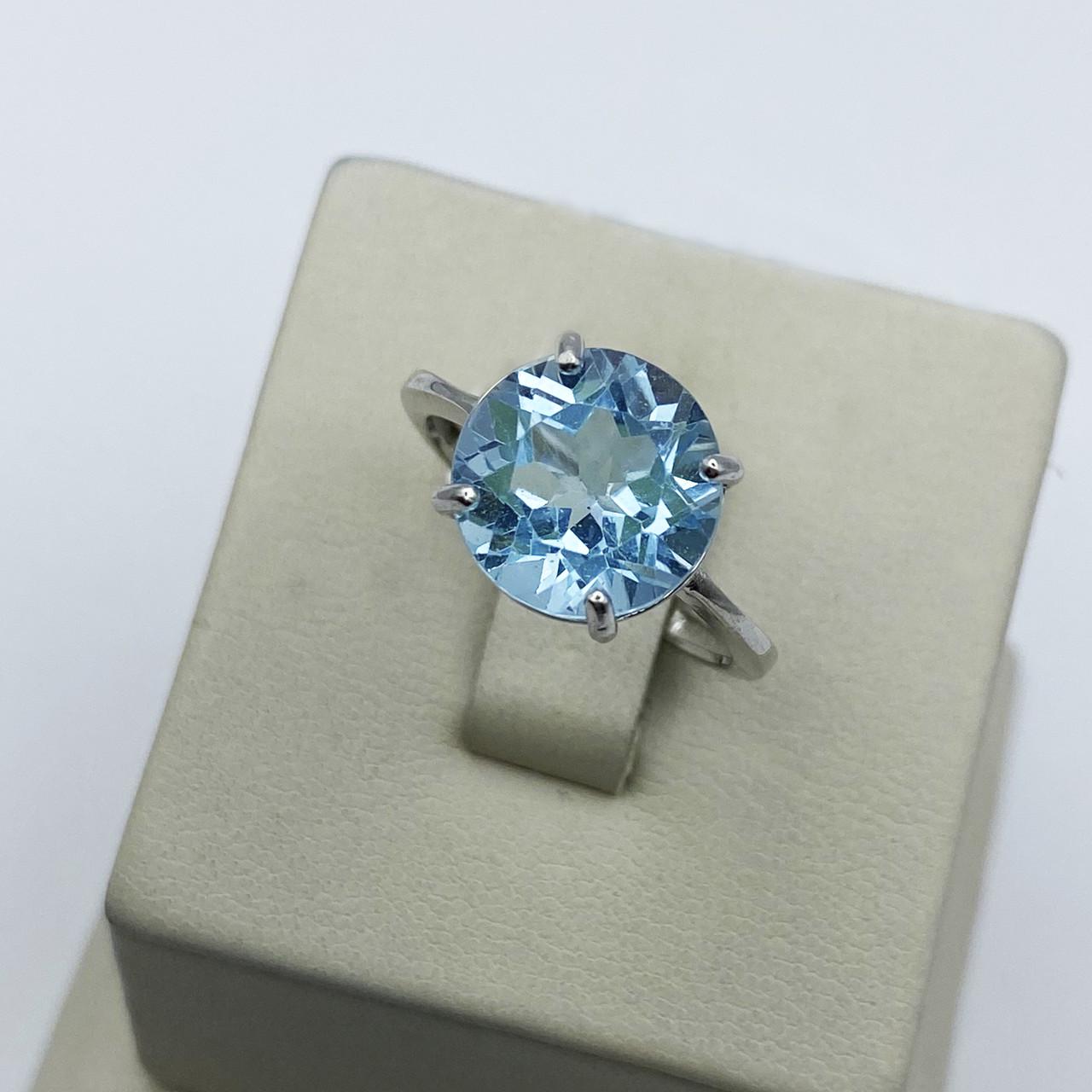 Каблучка срібна з блакитним топазом р. 18 3,28 г (1938260276)