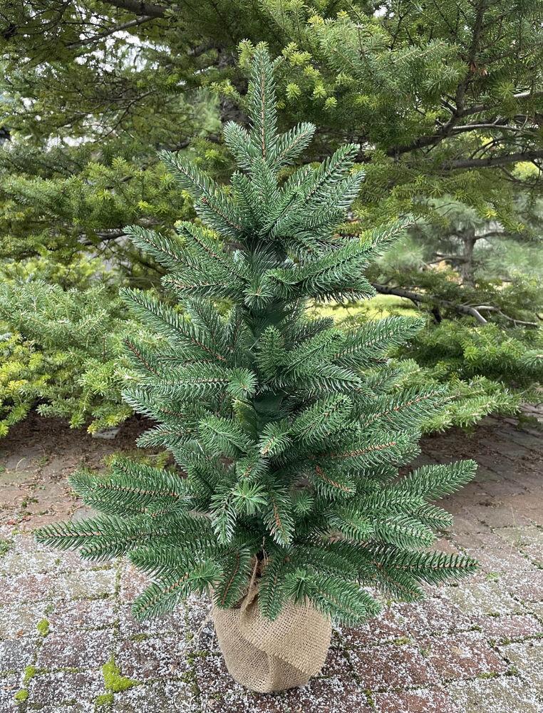 Ялинка лита Classic пишна в мішковині 70 см Зелений (210N/70/G)