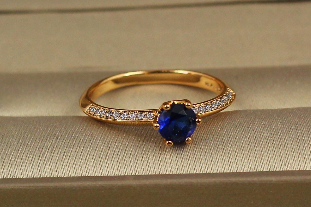 Каблучка Xuping Jewelry Акорд із синім каменем 5 мм р. 16 Золотистий