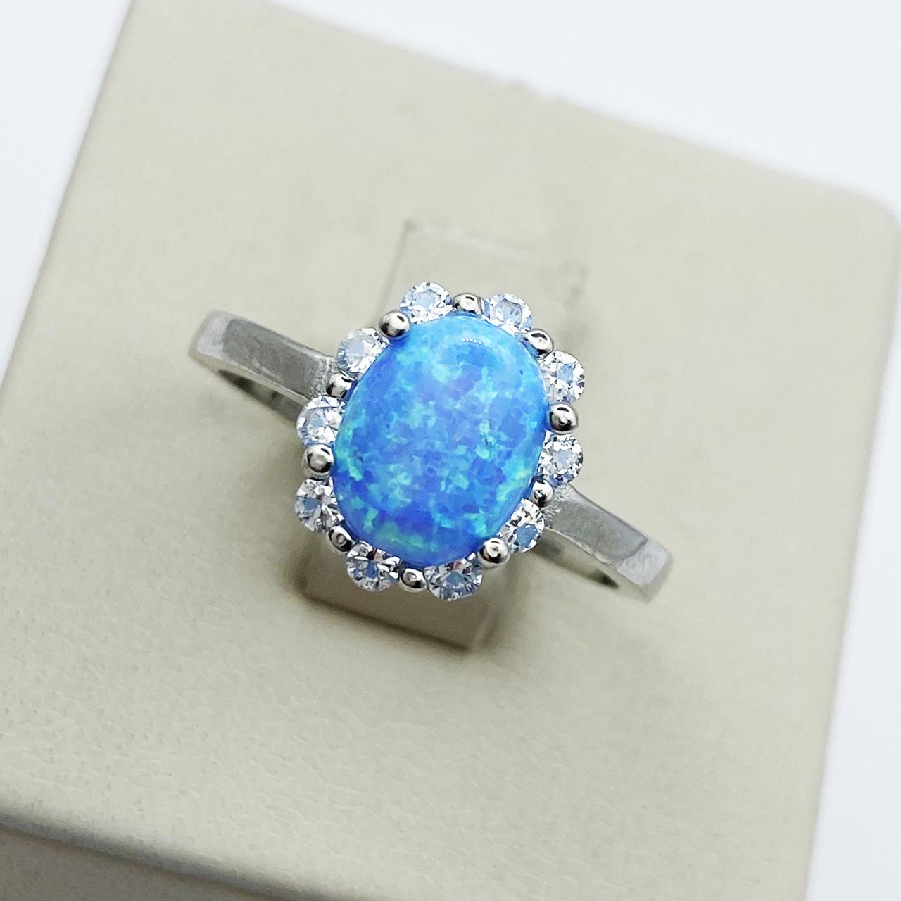 Кольцо серебряное с голубым опалом р. 18,5 3,22 г (1913381382)