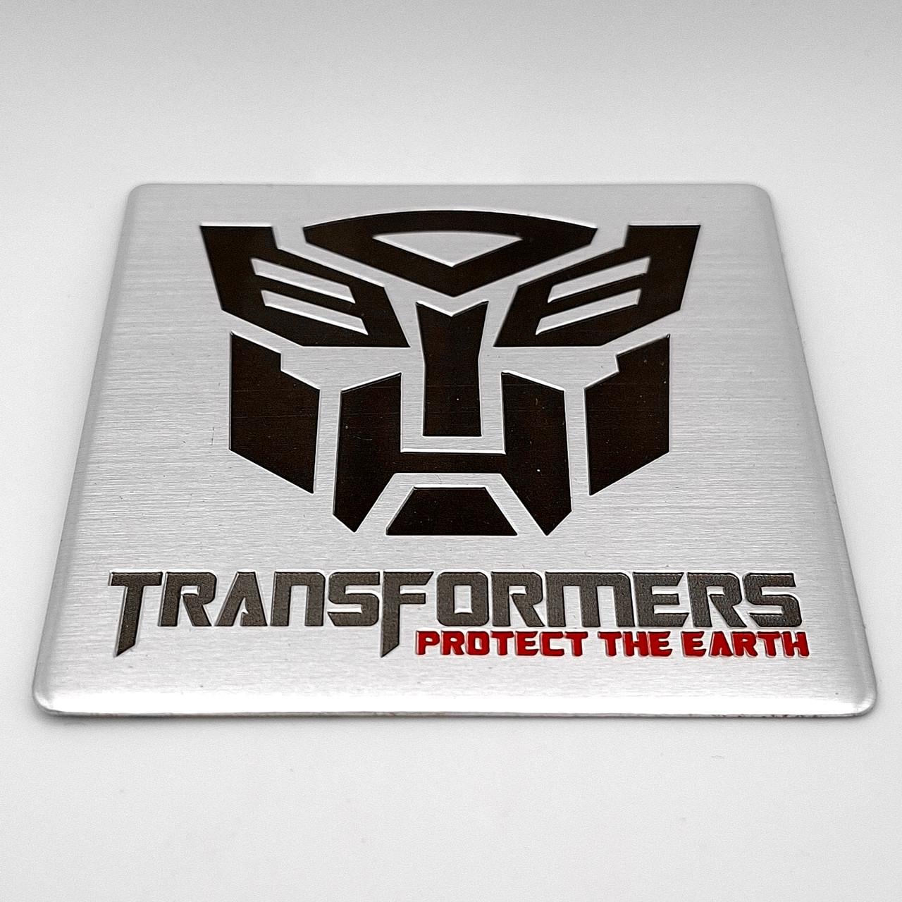 Емблема алюмінієва Трансформери Автоботи Transformers Autobots 8х8 см (2795749772)