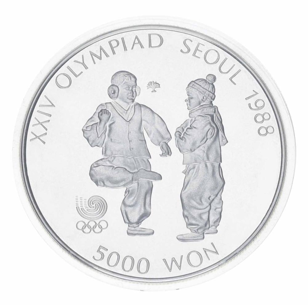 Коллекционная монета Южная Корея 5000 вон 1988 Серебро Proof XXIV летние Олимпийские игры в Сеуле 1988-Мальчики играют с юлой (М23347)