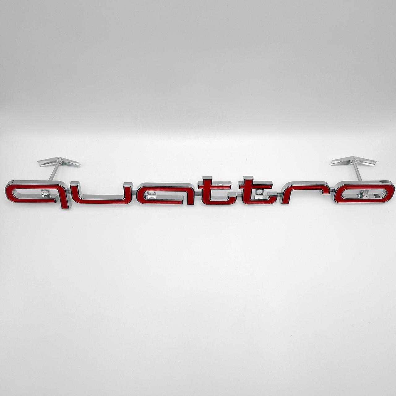 Эмблема Quattro Audi на решетку ABS 42х3,7 см Хром/Красный глянцевый (2879269672)