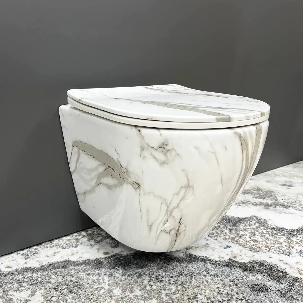 Унітаз підвісний VBI Vulcano безободковий 480x360 мм Мармур (RM-VBI-020406) Унітаз підвісний VBI Vulcano безободковий 480x360 мм Мармур (RM-VBI-020406)