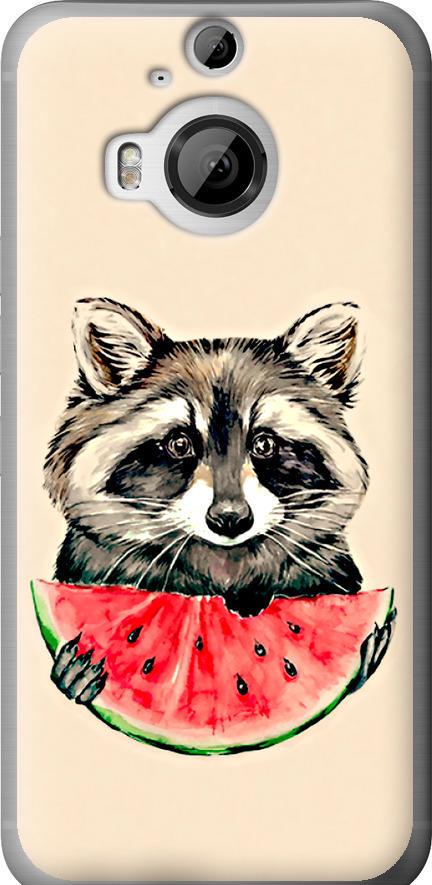 Чехол на HTC One M9 Plus Енотик с арбузом (4605u-134-42517) Чехол на HTC One M9 Plus Енотик с арбузом (4605u-134-42517)
