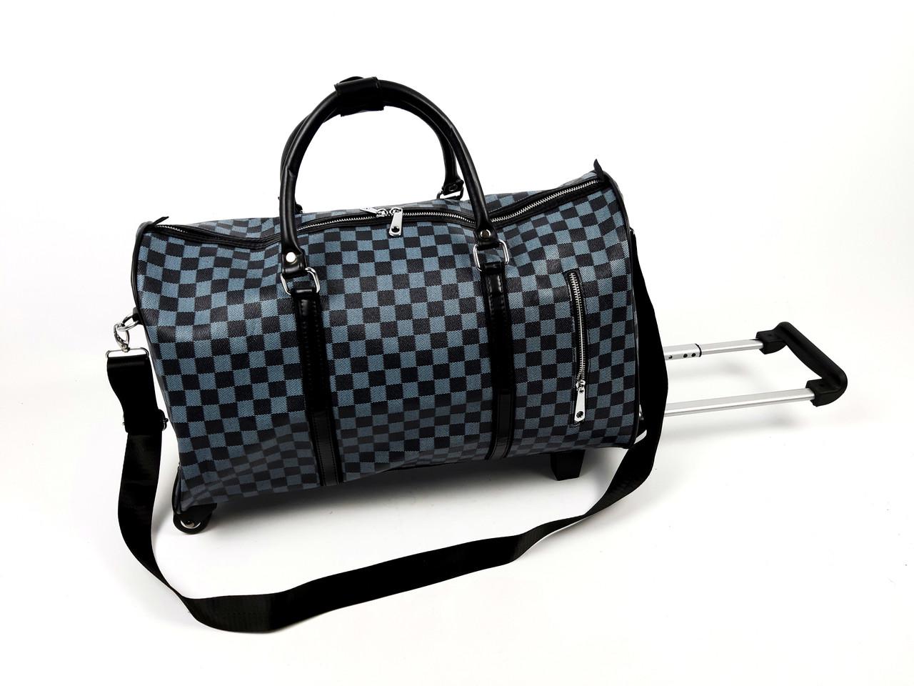 Сумка-валіза на колесах із ременем Sky Travel 50х20х34 см 53 л Синій (669-7)