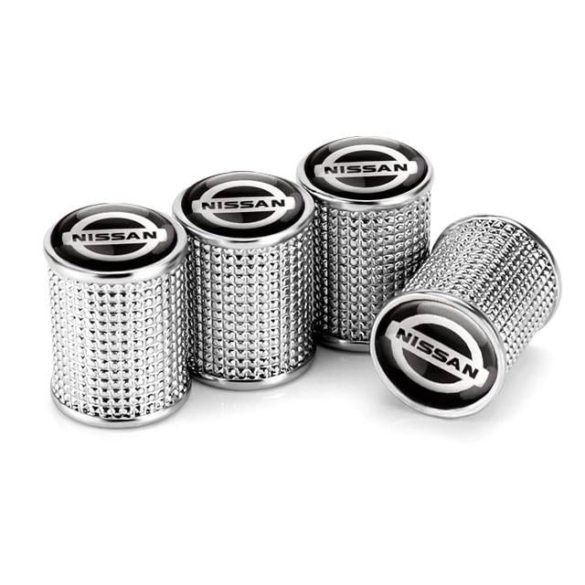 Набор защитных колпачков на ниппель SUNROZ Caps для Ниссан Lux Silver Metal Nissan 4 шт. (A-67663)