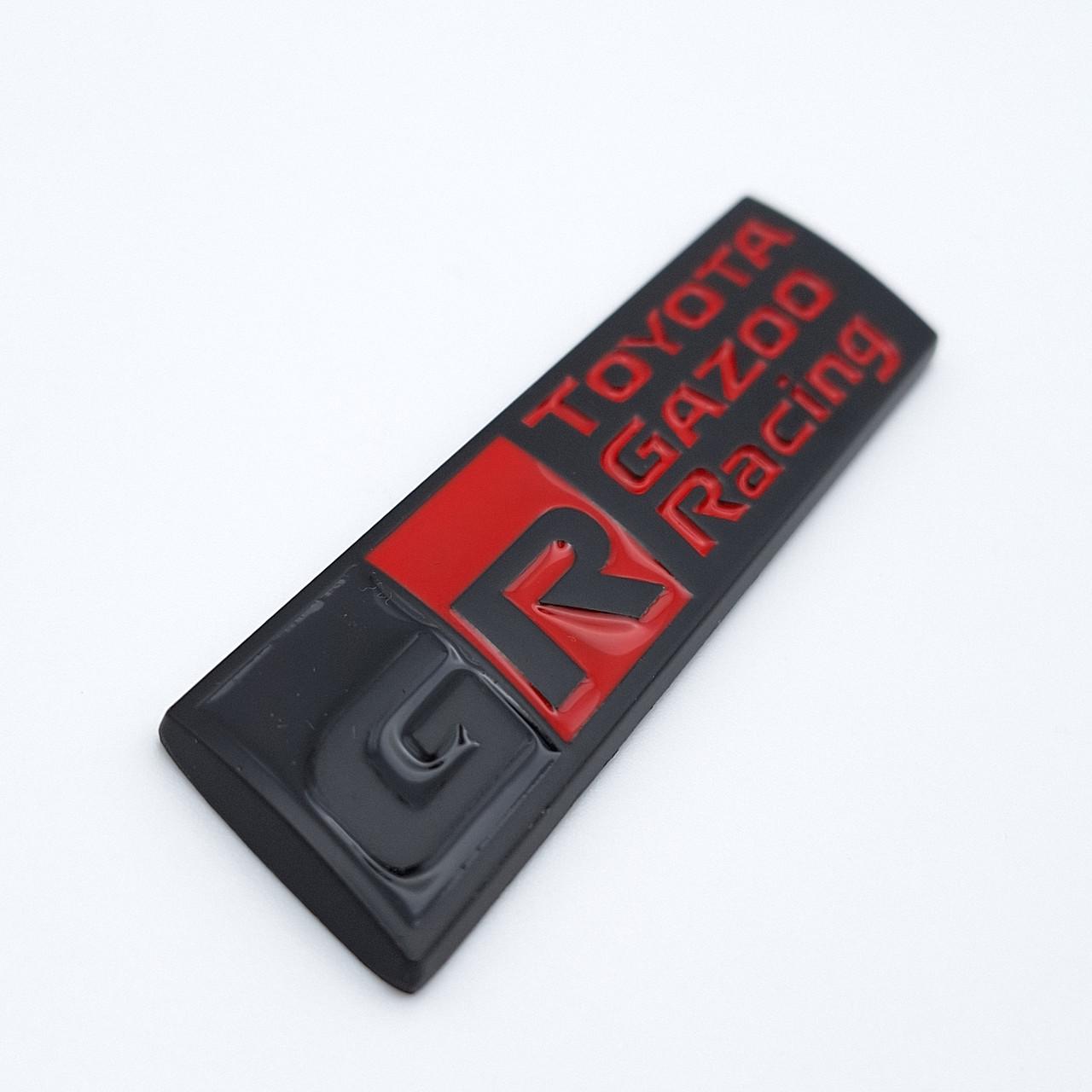 Эмблема плашка GR Toyota Gazoo Racing металл 9х2,3 см Черный/Красный матовый (2458449911)