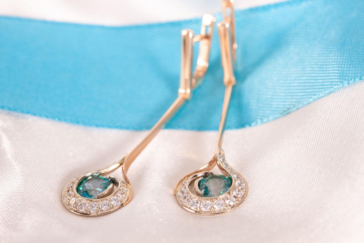 Сережки жіночі з червоного та білого золота з топазами (1629834393)