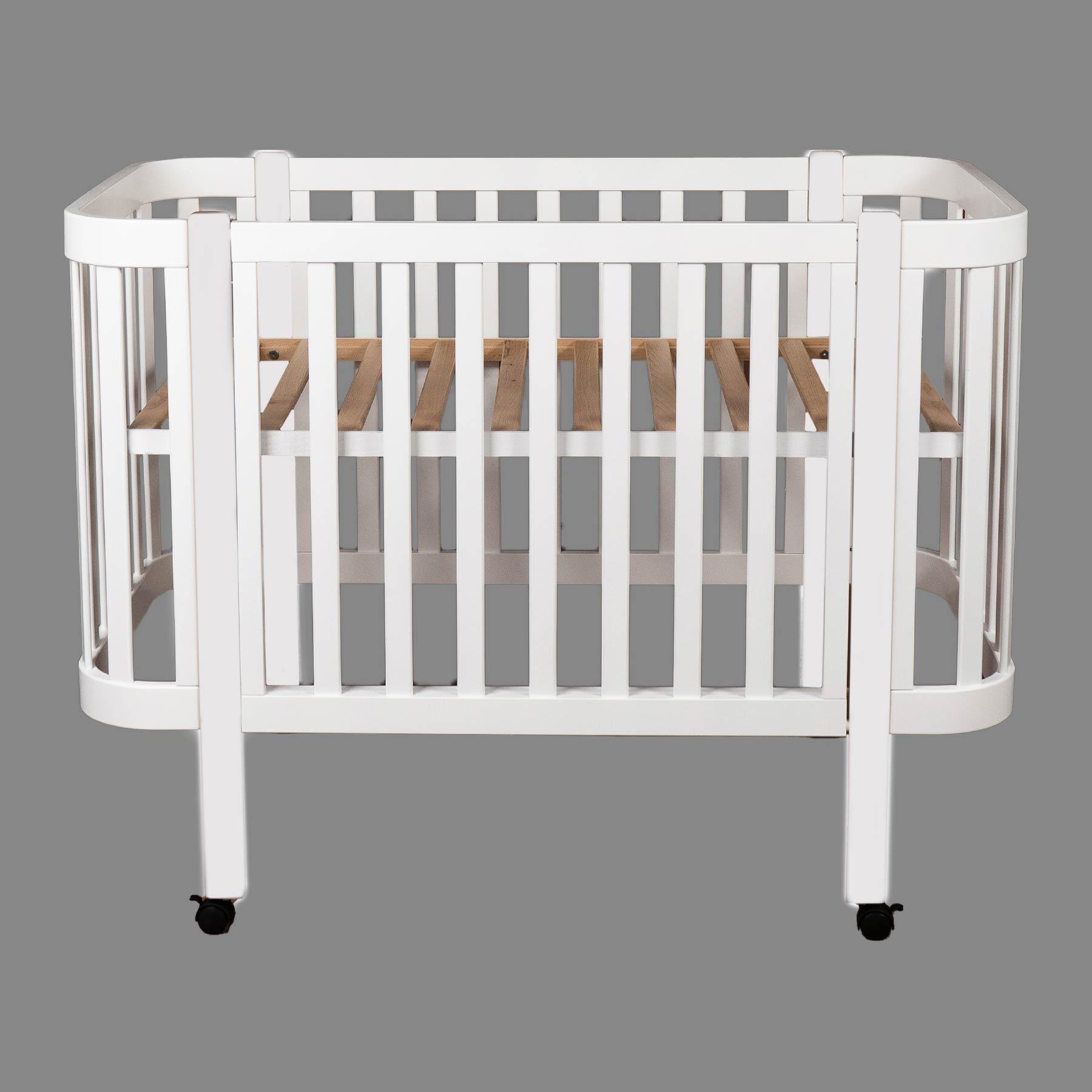 Детская кроватка Dominanta Венеция с подвижной боковиной Белый (ЛД 9 Б_01) Детская кроватка Dominanta Венеция с подвижной боковиной Белый (ЛД 9 Б_01)