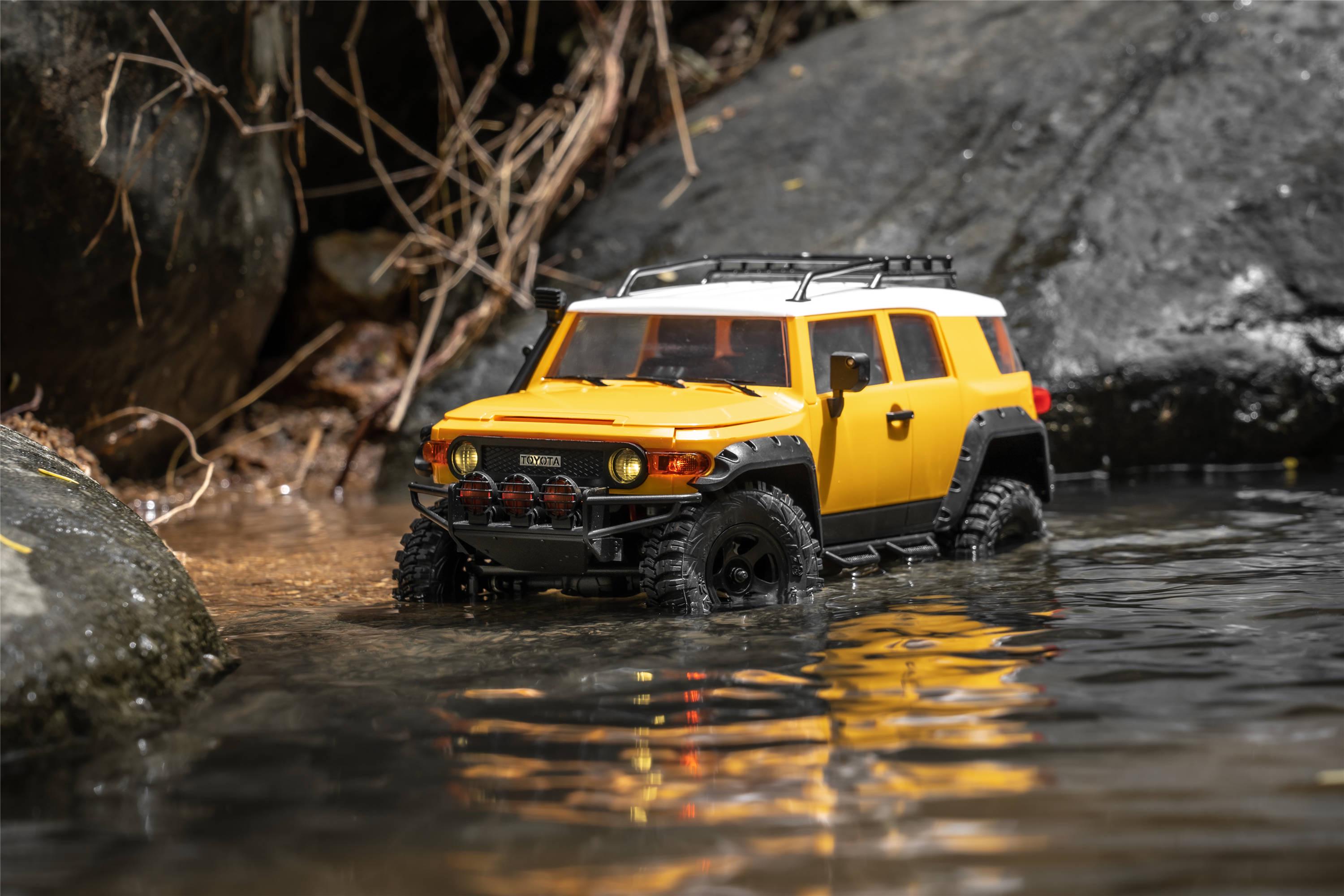 Машинка на радиоуправлении FMS 1:18 FJ Cruiser RTR Yellow - фото 13 Машинка на радиоуправлении FMS 1:18 FJ Cruiser RTR Yellow - фото 13