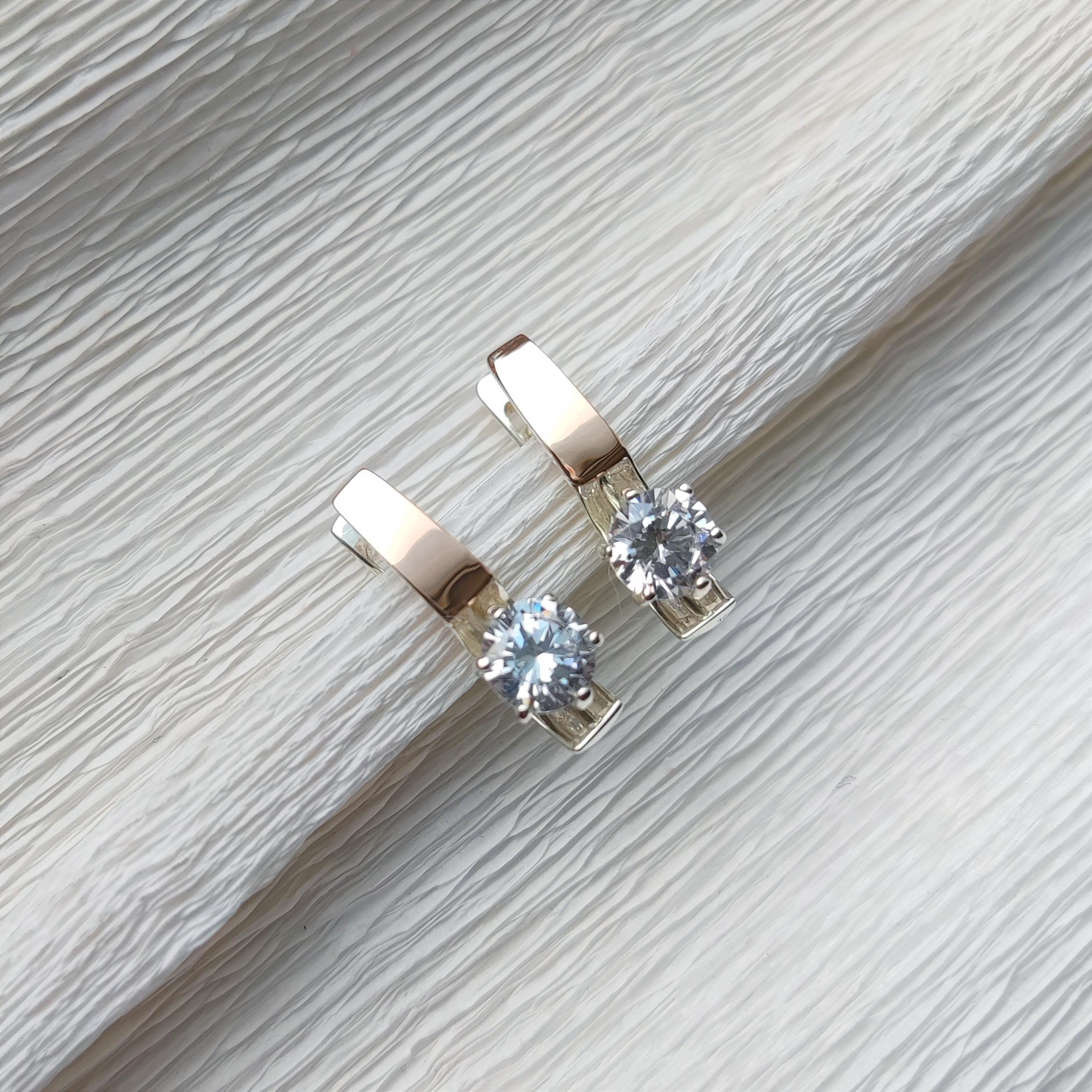 Серебряные серьги Хай-тэк с золотыми вставками