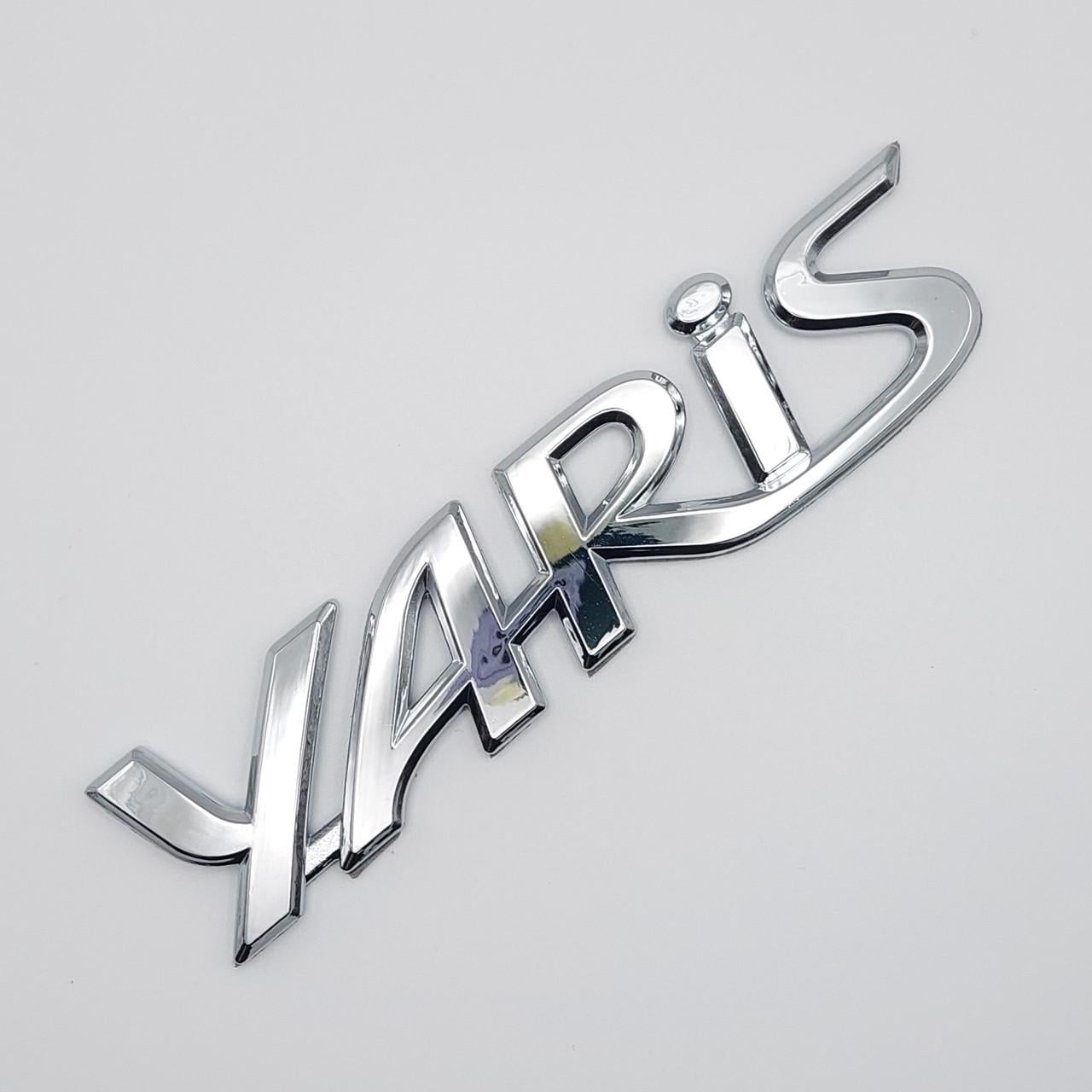 Эмблема надпись Yaris Toyota ABS 13,7х3,5 см Хром глянцевый (1813912387)