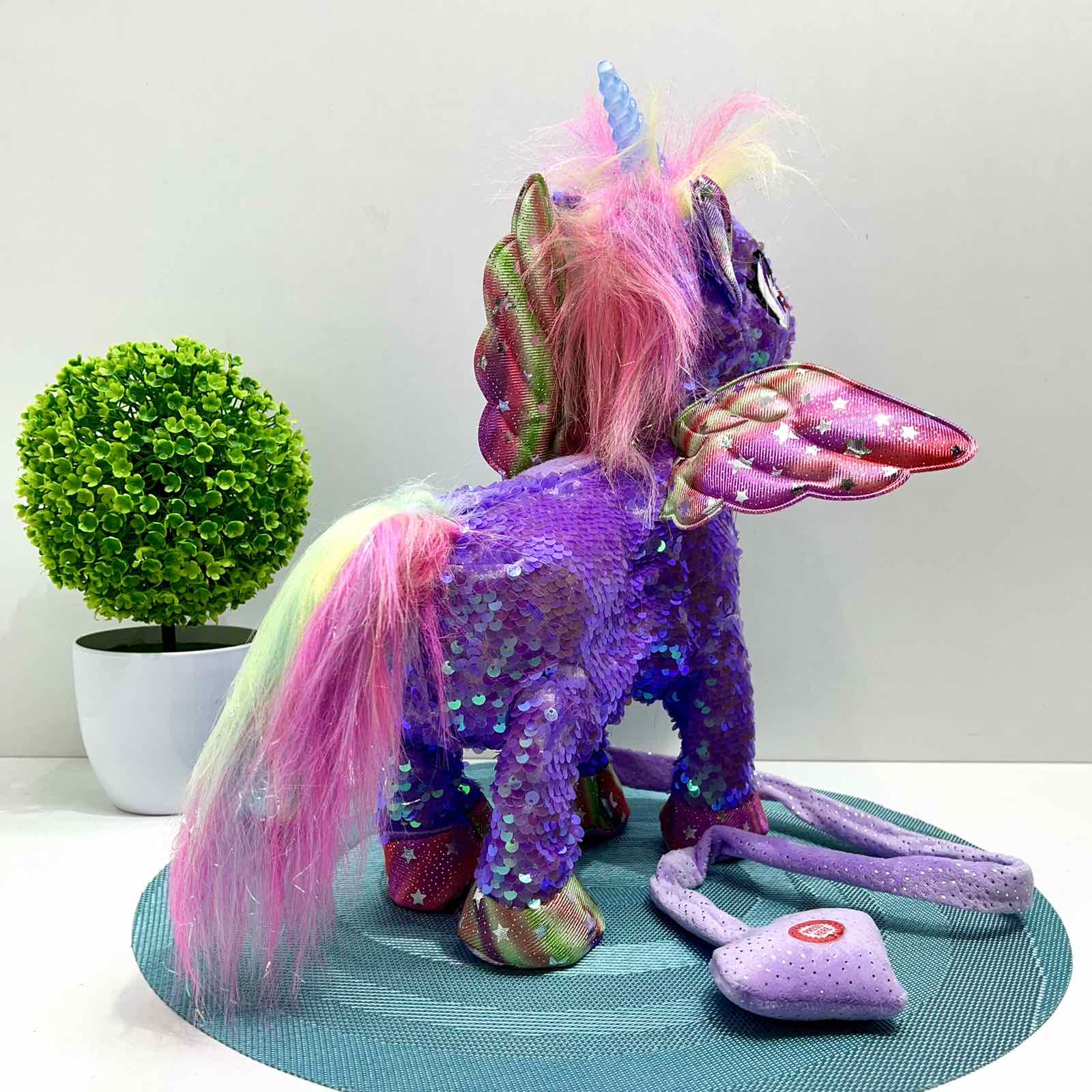 Интерактивная игрушка мягкая Сказочный единорог поводок/звук/свет Фиолетовый (M 6203 I UA) - фото 3 Интерактивная игрушка мягкая Сказочный единорог поводок/звук/свет Фиолетовый (M 6203 I UA) - фото 3
