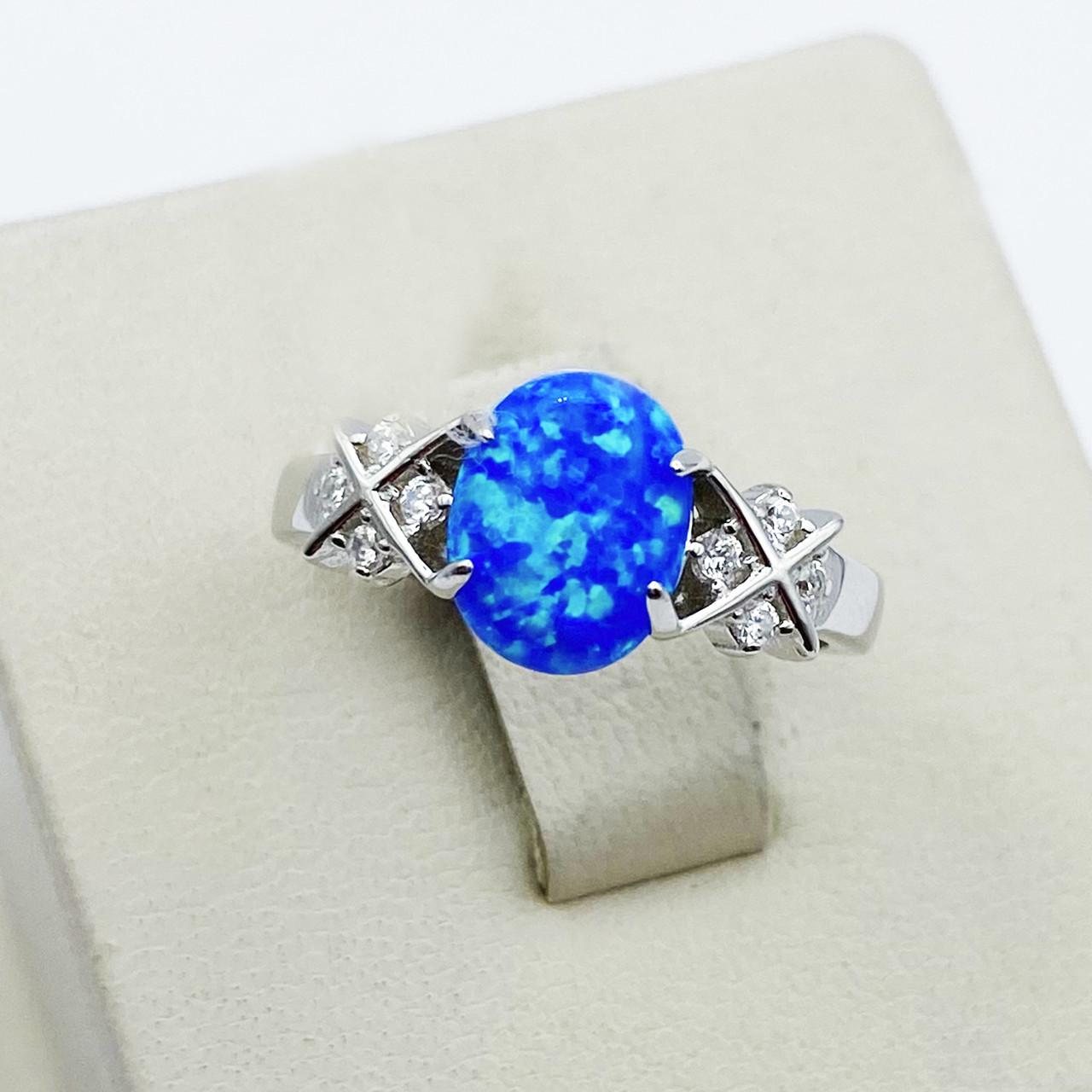 Кольцо серебряное с синим опалом р. 17,5 2,34 г (1910480847)