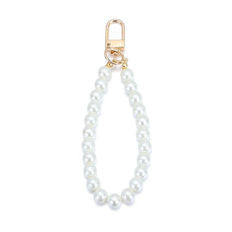 Брелок на карабине из искусственного жемчуга Белый с золотистым (27086335) Брелок на карабине из искусственного жемчуга Белый с золотистым (27086335)