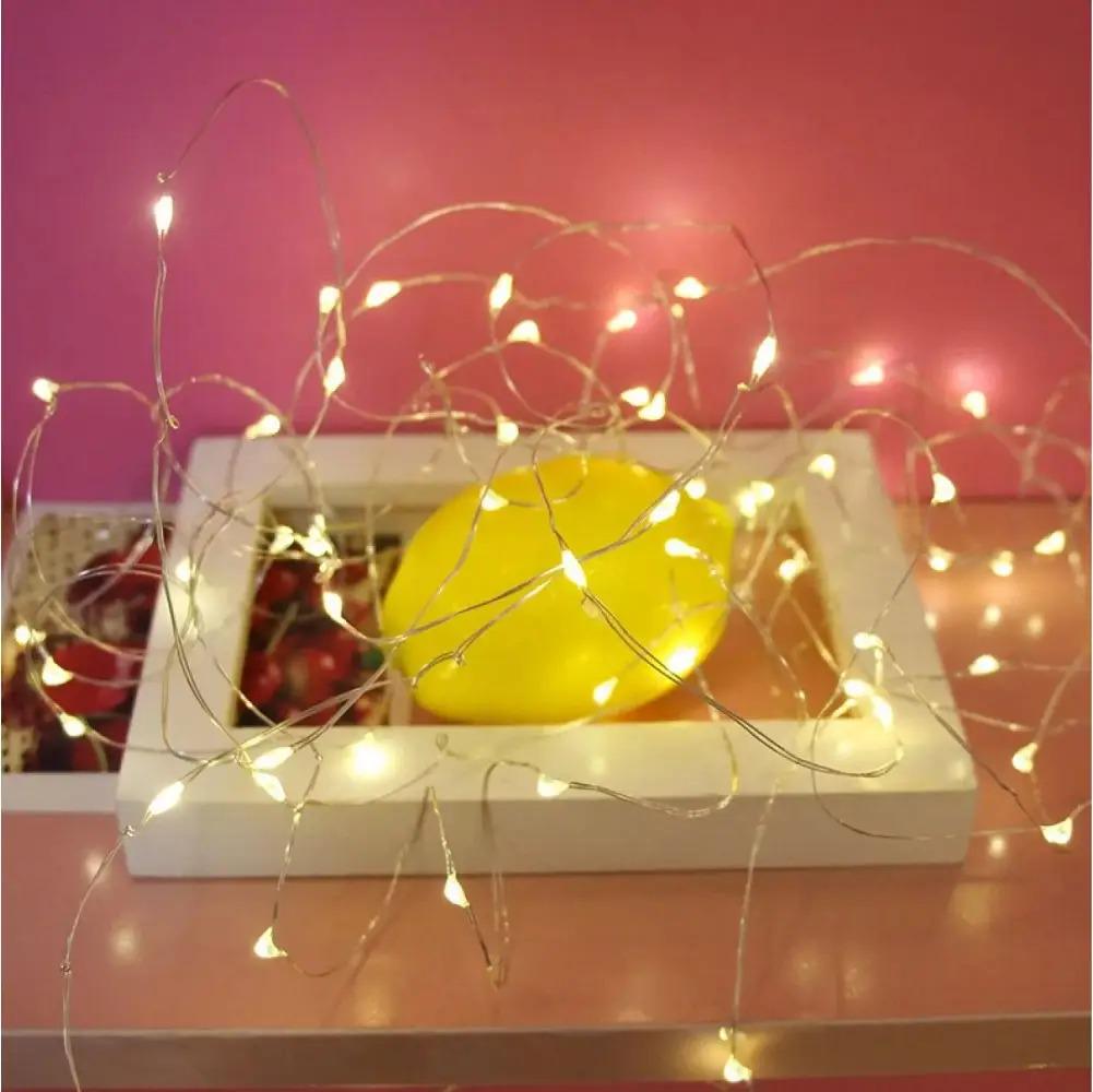 Гірлянда нитка Роса на батарейках 2хАА 5 м 50LED теплий білий - фото 4 Гірлянда нитка Роса на батарейках 2хАА 5 м 50LED теплий білий - фото 4