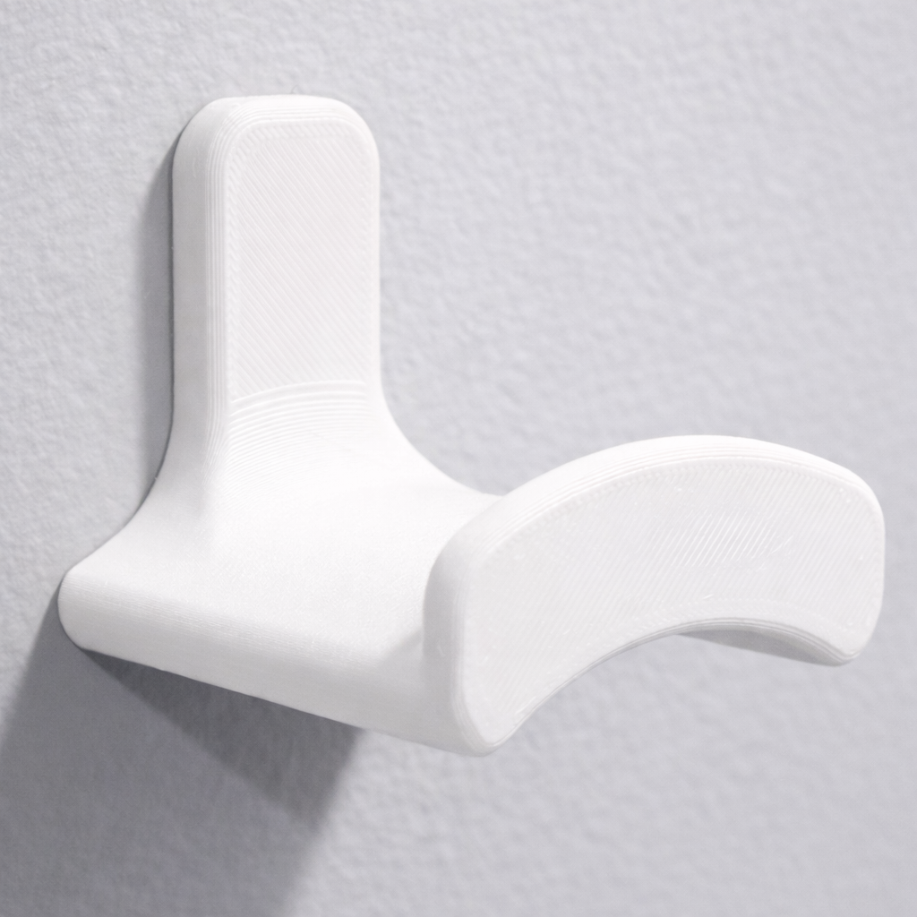 Тримач настінний для навушників із прихованим кріпленням пластик Білий