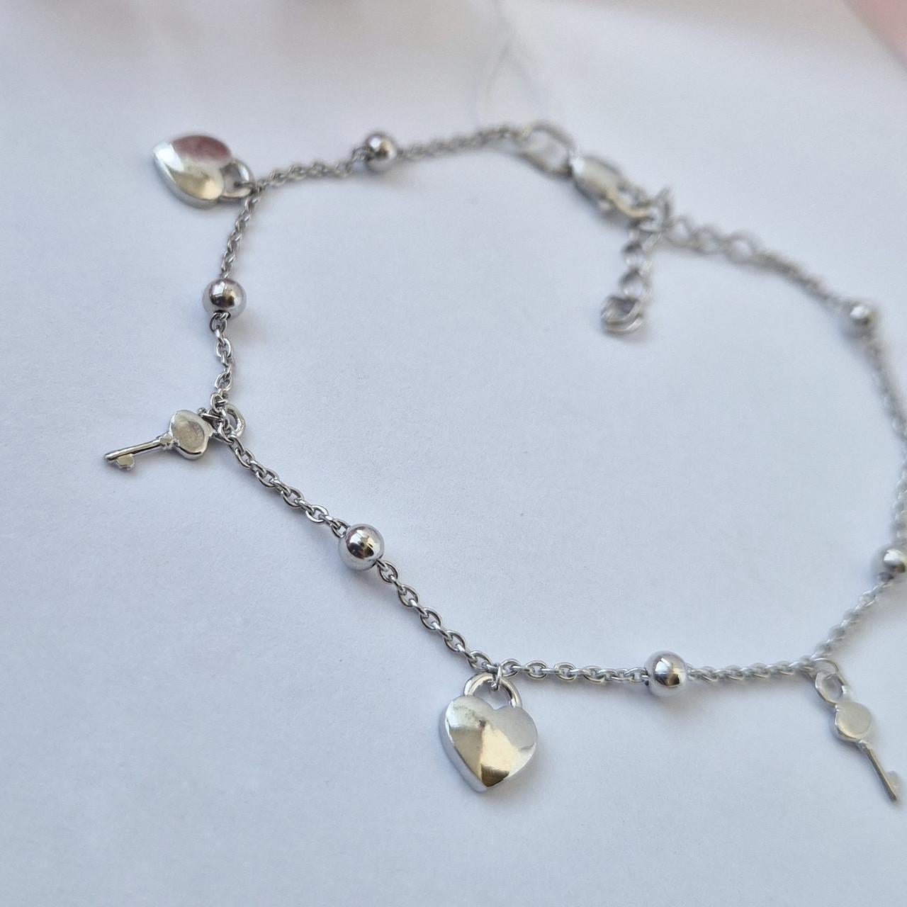 Браслет на руку Ключик и Замок с подвесками без камней из серебра 16-19 см 925 пробы (75299)