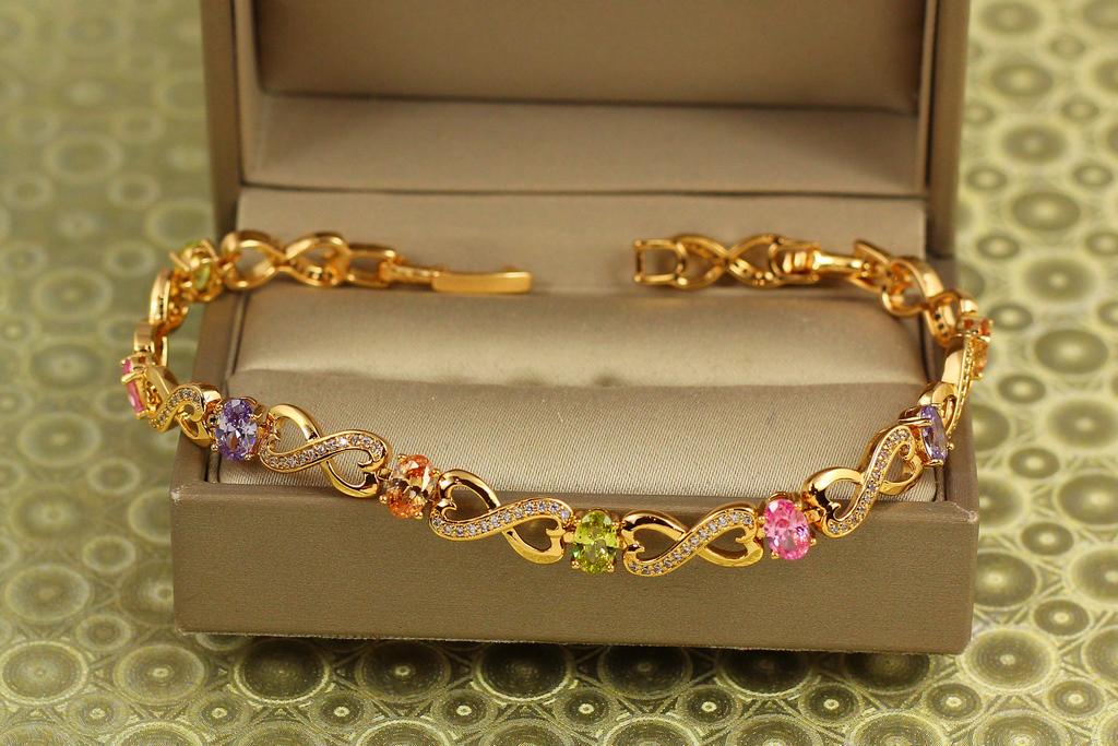Браслет Xuping Jewelry Шепот росы с разноцветными камнями 17 см 6 мм Золотистый (34118250)
