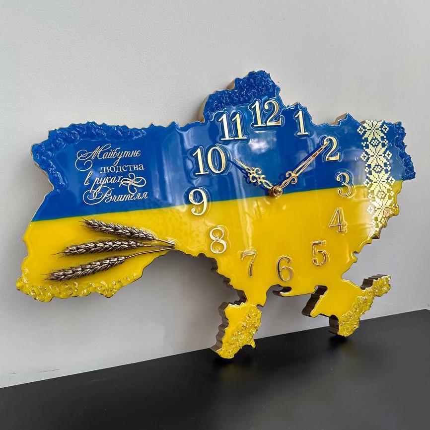 Часы настенные из эпоксидной смолы Майбутнє людства в руках Вчителя 50x34 см