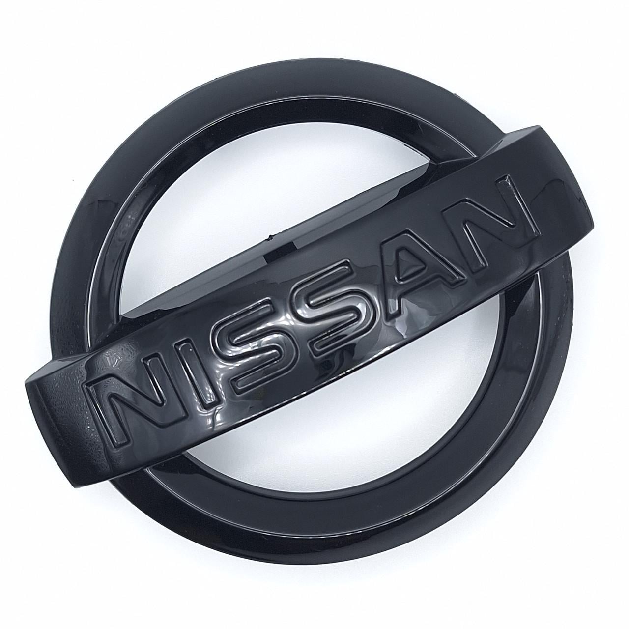 Эмблема Nissan на решетку радиатора 130х112 мм 62890 1DA0B Черный глянцевый (2325632613)