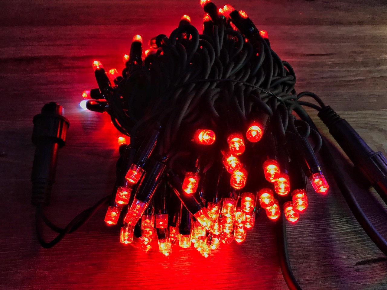 Світлодіодна гірлянда LED 100 з чорним проводом червона (218-21513561-3) Світлодіодна гірлянда LED 100 з чорним проводом червона (218-21513561-3)
