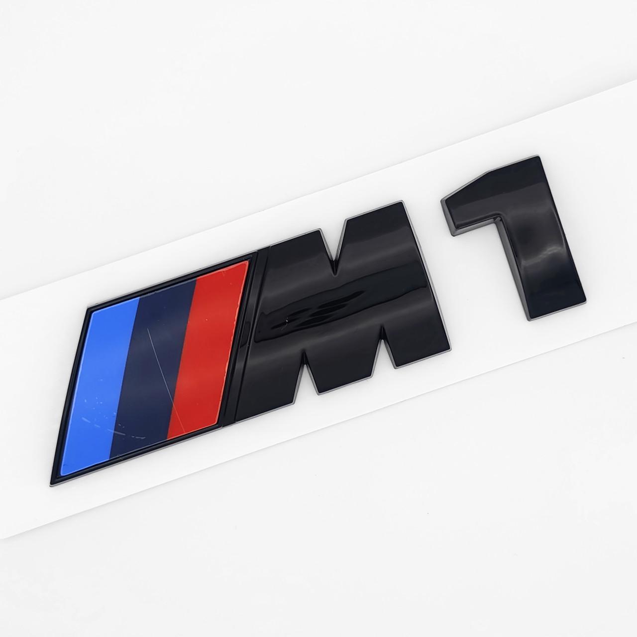 Эмблема надпись M1 BMW 10,3х2,7 см ABS Черный глянцевый (3037988679)