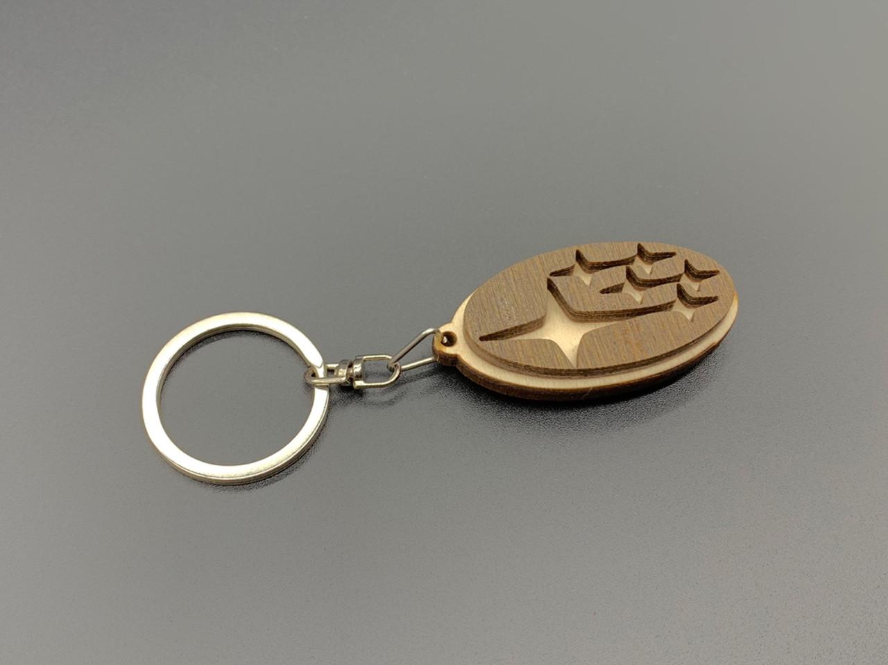 Брелок автомобильный деревянный с маркой Subaru 5х2,5 см Светло-коричневый (925558438) Брелок автомобильный деревянный с маркой Subaru 5х2,5 см Светло-коричневый (925558438)