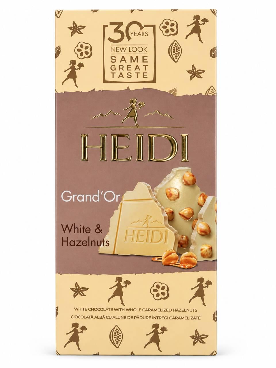 Білий шоколад Heidi із цілим карамелізованим фундуком і кукурудзяними пластівцями Білий шоколад Heidi із цілим карамелізованим фундуком і кукурудзяними пластівцями