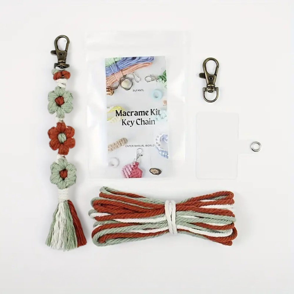 Набір макраме для рукоділля для ручного в'язання плетеного брелока Квіти для ключів триколірний 20х2,2 см Зелений/Помаранчевий/Білий Набір макраме для рукоділля для ручного в'язання плетеного брелока Квіти для ключів триколірний 20х2,2 см Зелений/Помаранчевий/Білий