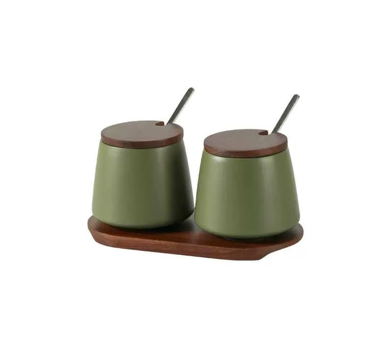 Набір контейнерів для солі/перцю/приправ та спецій з кришками та ложками на деревʼяній підставці 2 шт. Зелений (31217131)