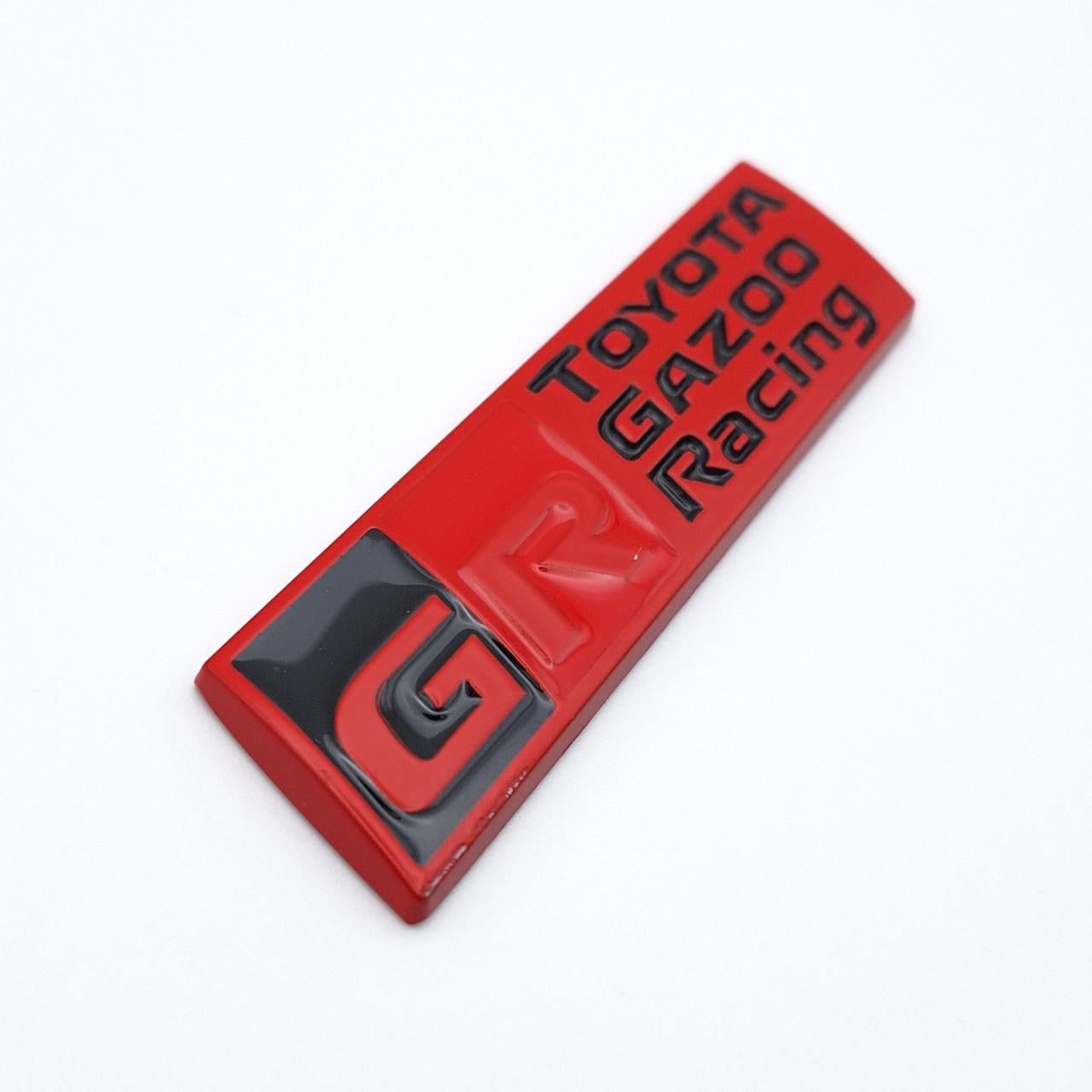 Эмблема плашка GR Toyota Gazoo Racing металл 9х2,3 см Красный/Черный матовый (2458450857)