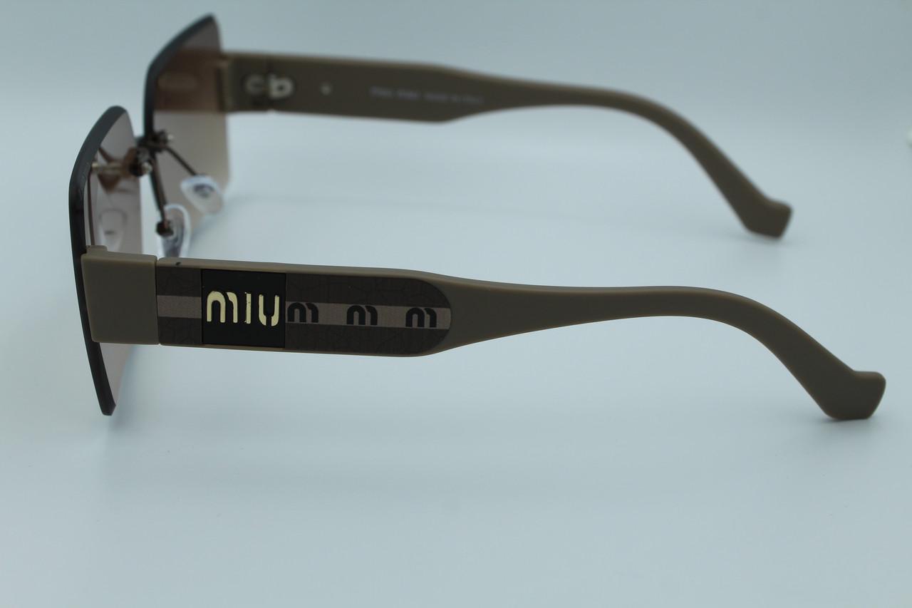 Сонцезахисні окуляри жіночі дизайнерські (58094 №1) - фото 7 Сонцезахисні окуляри жіночі дизайнерські (58094 №1) - фото 7