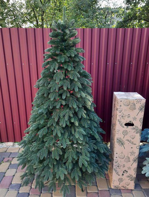 Ялинка лита Швейцарська штучна зелена 150 см з підставкою в коробці (26313373) - фото 1