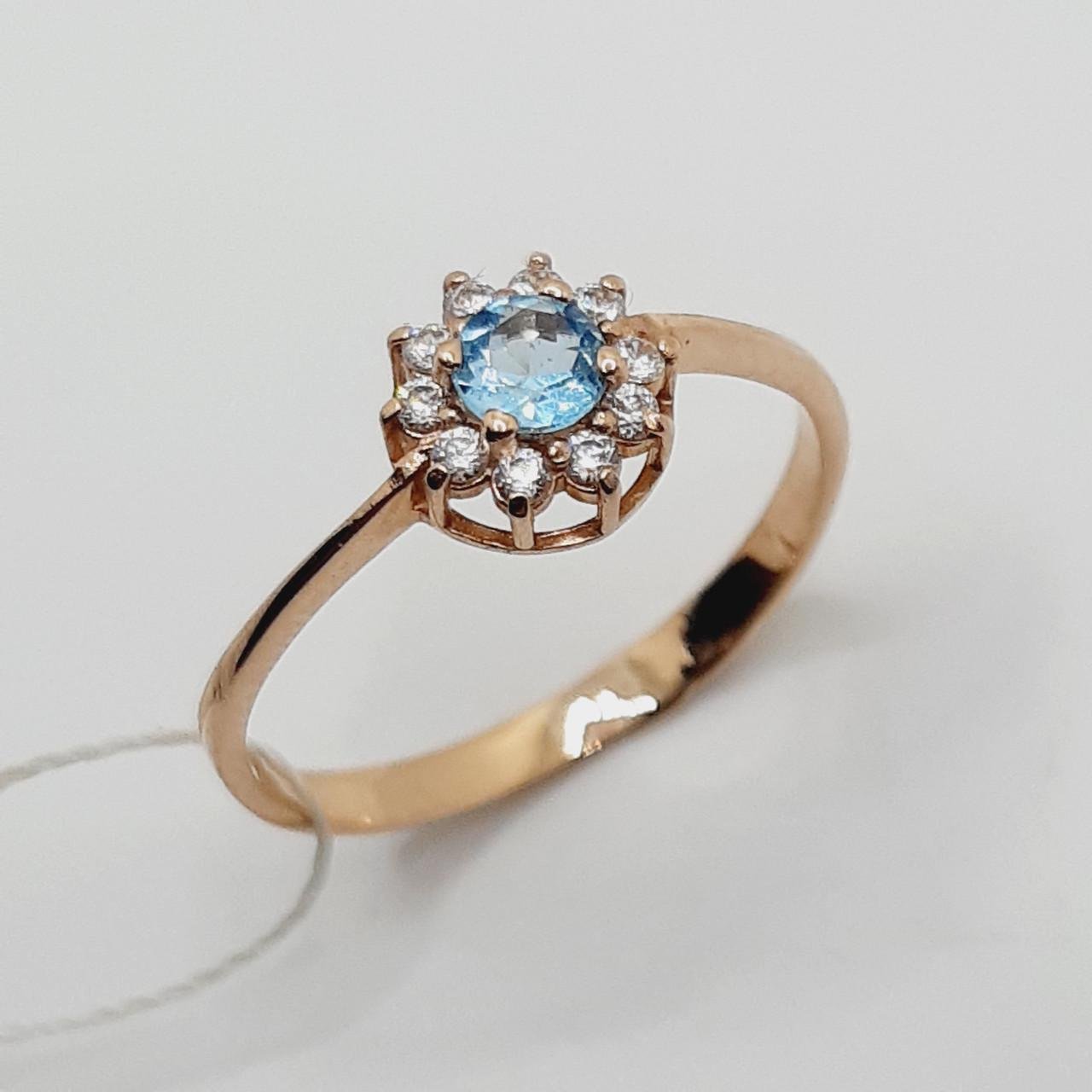 Кольцо золото голубой топаз 585° 1,74 г р. 18,5 (362-1803)