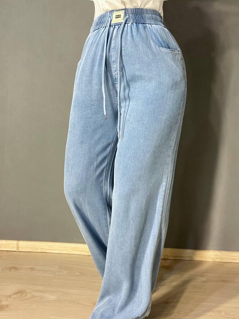 Джинсы женские Immet 5606-2 палаццо талия на резинке тенсель р. 33 Голубой (26675071) - фото 4 Джинсы женские Immet 5606-2 палаццо талия на резинке тенсель р. 33 Голубой (26675071) - фото 4