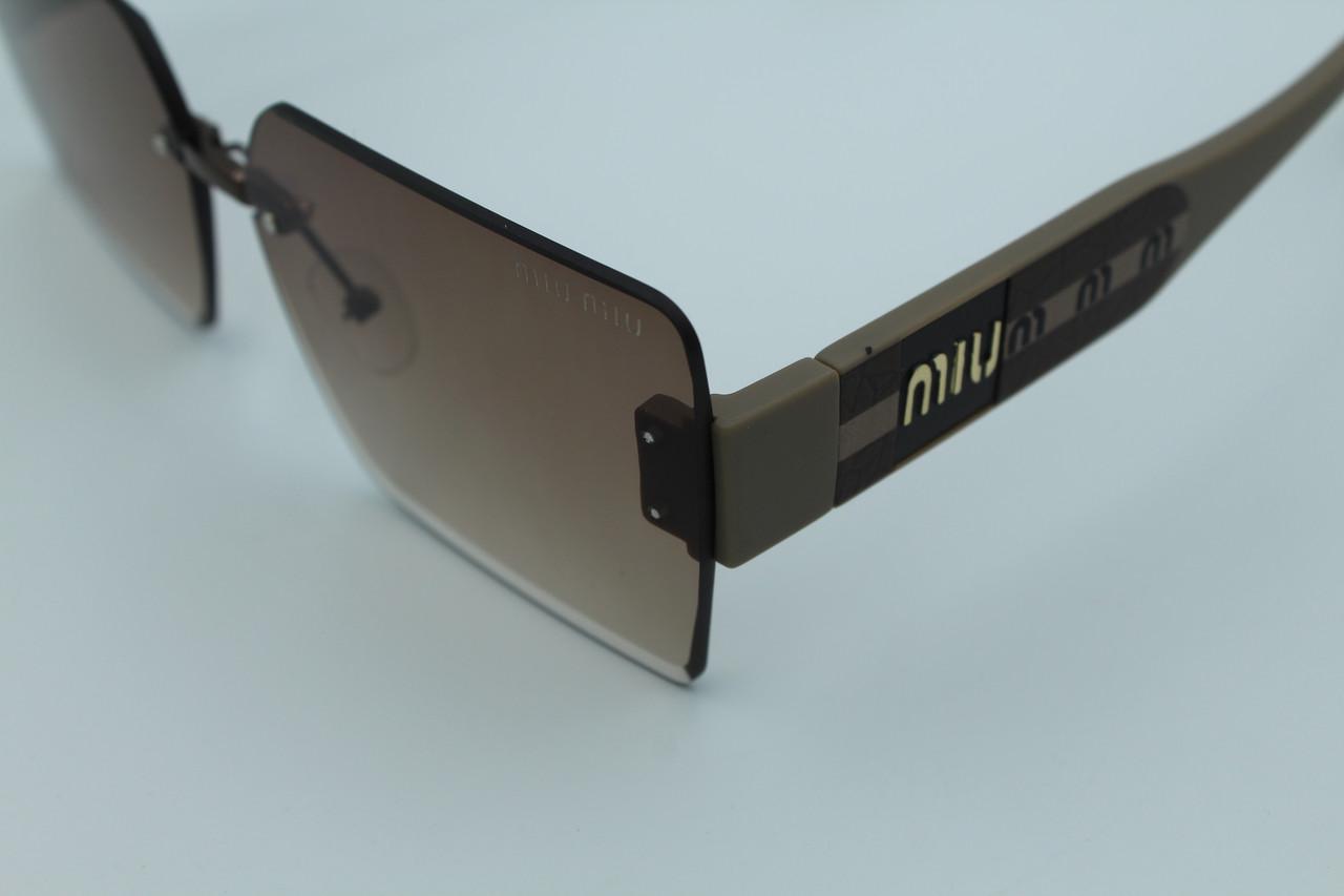 Сонцезахисні окуляри жіночі дизайнерські (58094 №1) - фото 5 Сонцезахисні окуляри жіночі дизайнерські (58094 №1) - фото 5