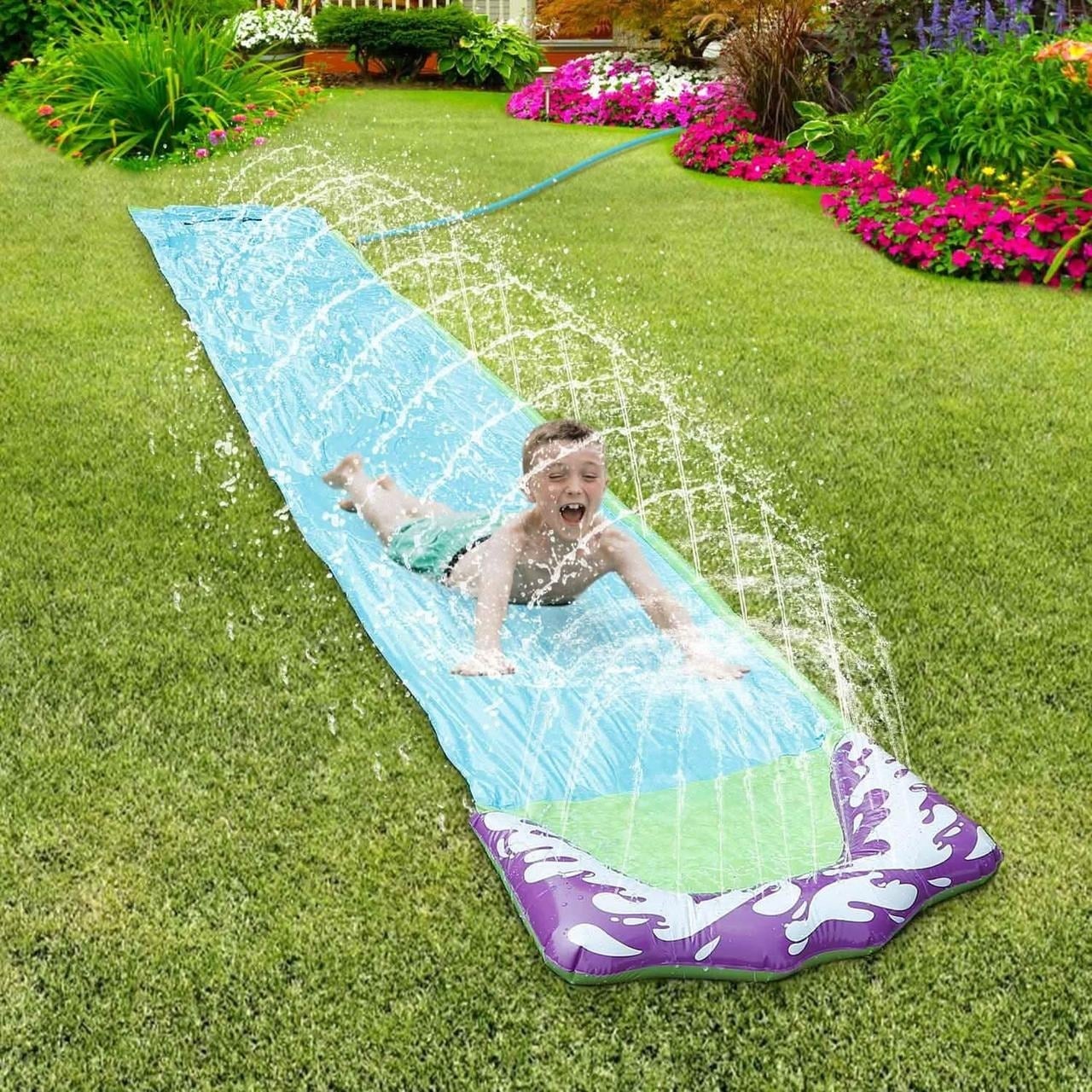 Надувная горка для детей с подачей воды длиной 480 см (water-slide) Надувная горка для детей с подачей воды длиной 480 см (water-slide)