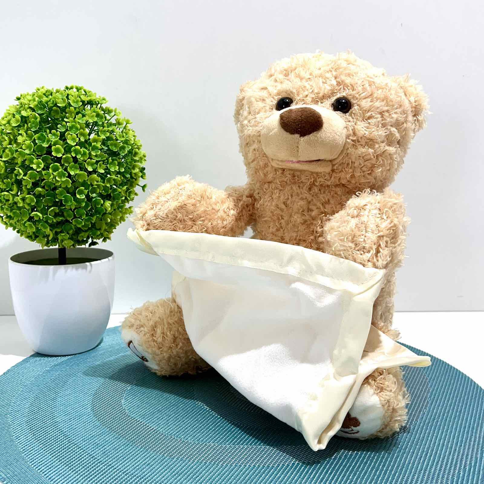 Интерактивная игрушка Мишка-сказочник играет в прятки/рассказывает сказки Бежевый (M 5843 I UA) - фото 1 Интерактивная игрушка Мишка-сказочник играет в прятки/рассказывает сказки Бежевый (M 5843 I UA) - фото 1