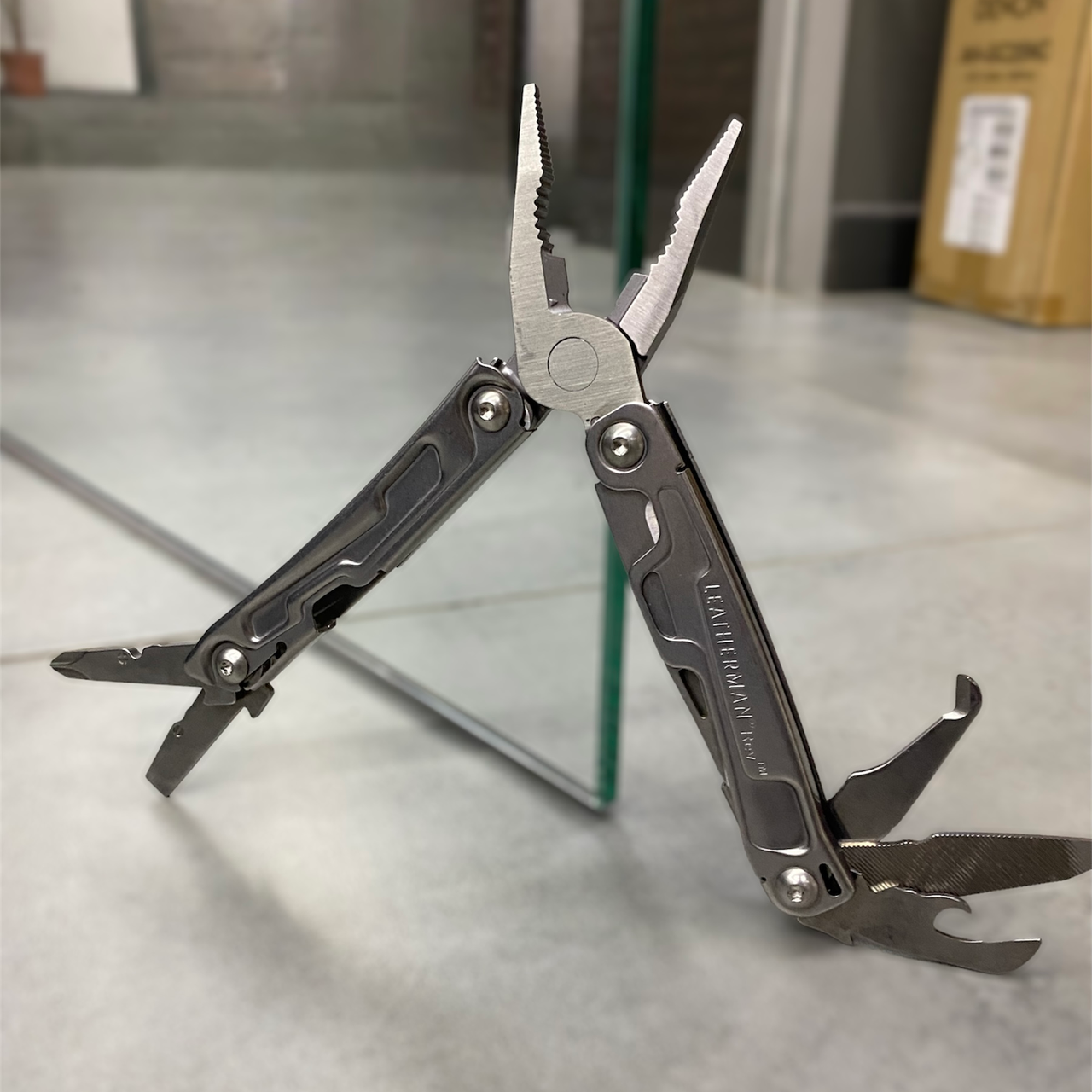 Мультиинструмент Leatherman REV 13 инструментов (1657641008)