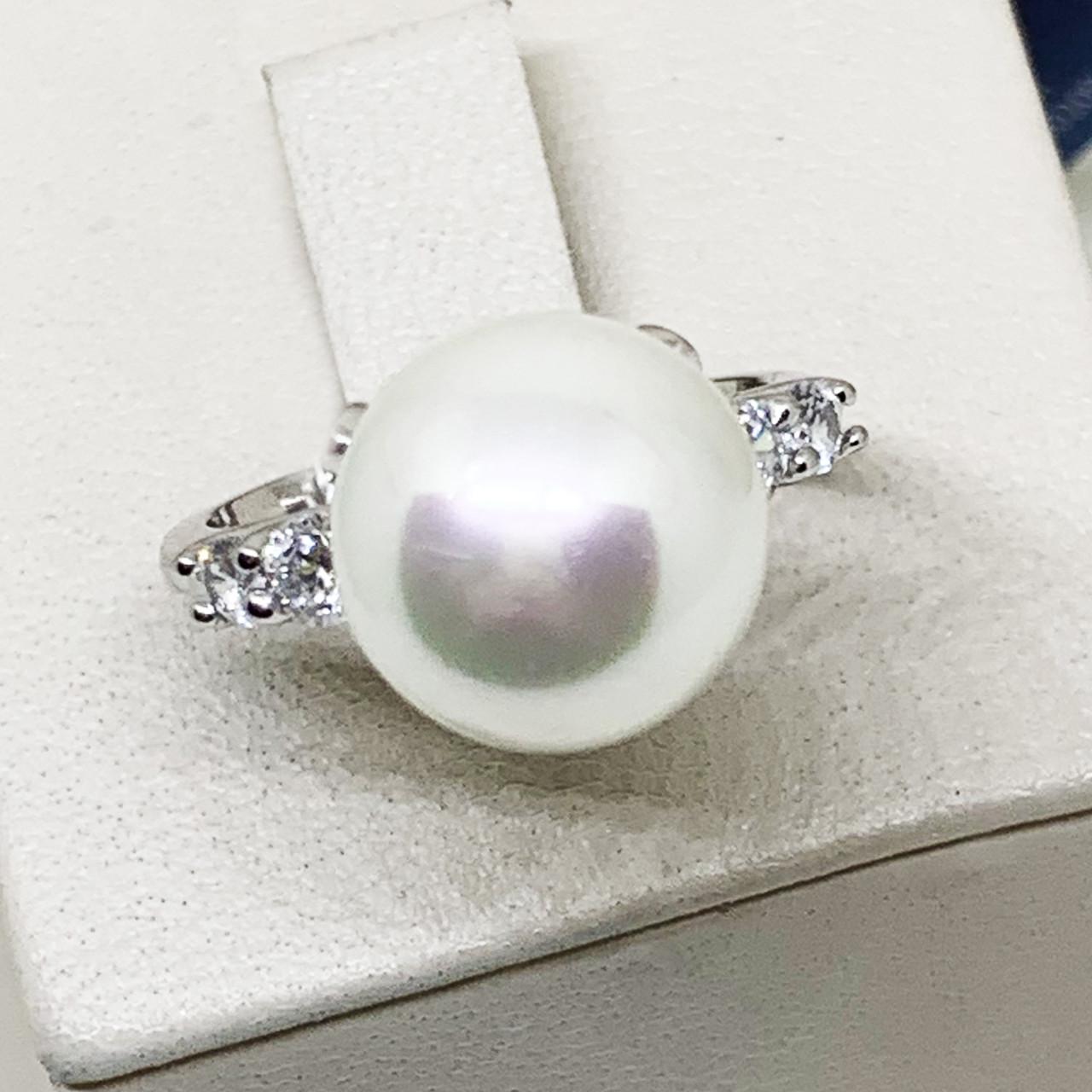 Кольцо серебряное с жемчугом и кубическим цирконием р. 18 5,28 г (1688044716)