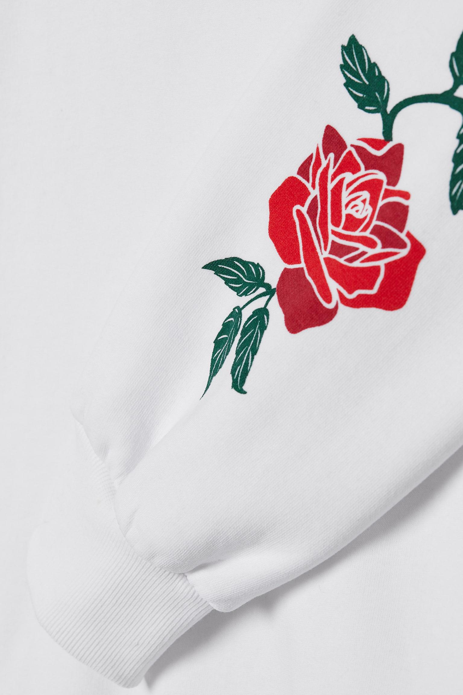 Світшот H&M з трояндою XS NY Білий (551055П) - фото 3 Світшот H&M з трояндою XS NY Білий (551055П) - фото 3