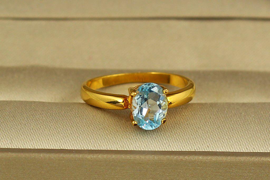 Кольцо один голубой топаз р. 17 Золотистый (29044617)